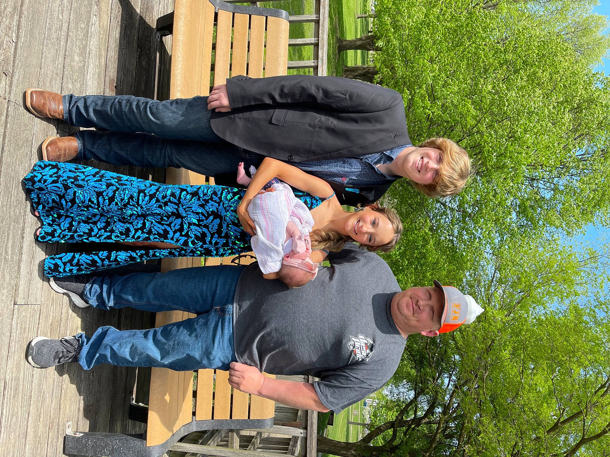 Brynleigh is registered to the contest to win money with this photo: arm, bag, clothing, event, fun, grass, green, happy, headwear, jeans, joy, leg, leisure, luggage_and_bags, people_in_nature, person, plant, shoe, sky, smile