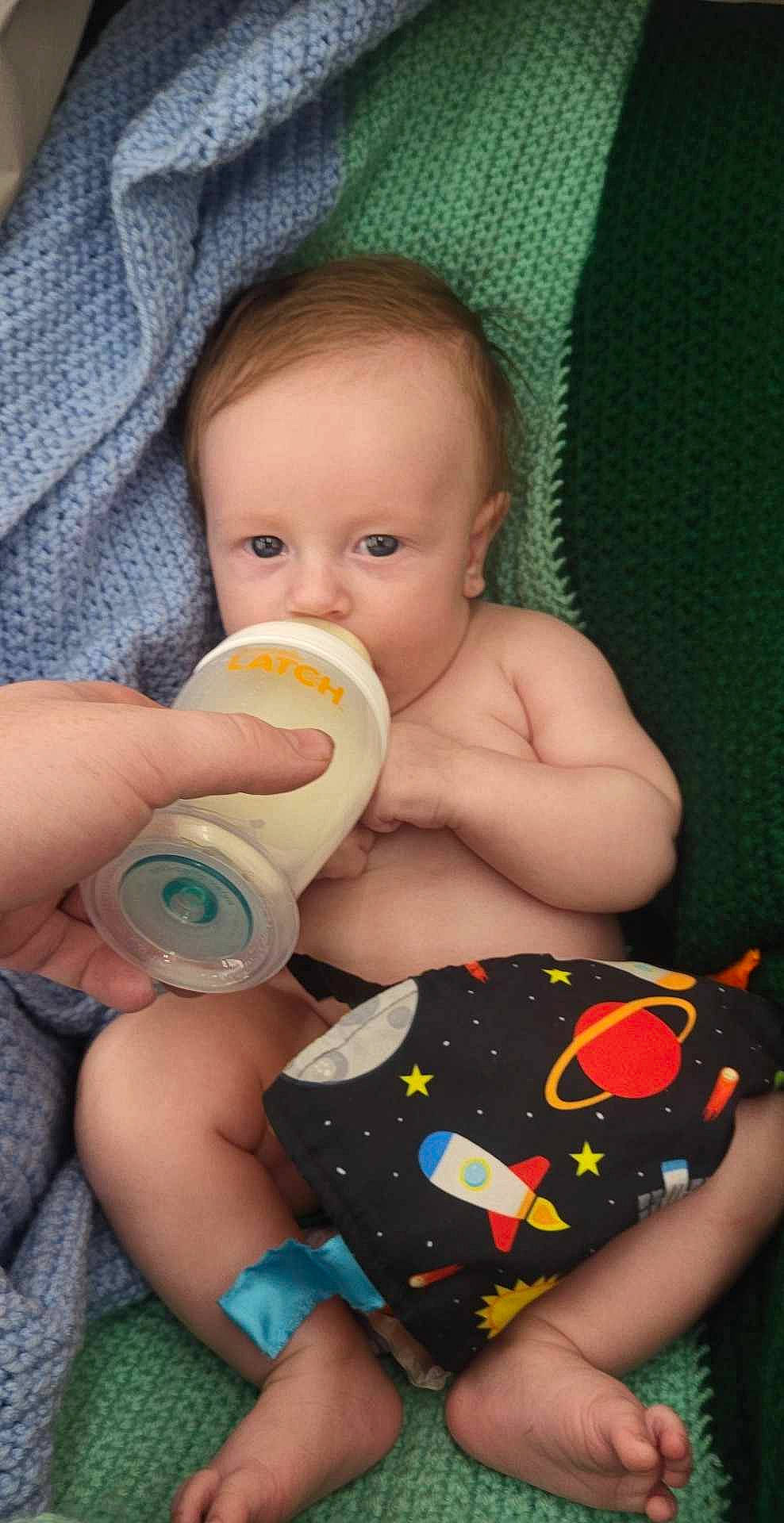Hoss joined the competition — help win amazing prizes! abdomen, baby, baby_bottle, baby_playing_with_toys, baby_products, baby_toddler_clothing, cheek, child, comfort, finger, hand, happy, mouth, nail, nose, person, play, sitting, skin, thumb