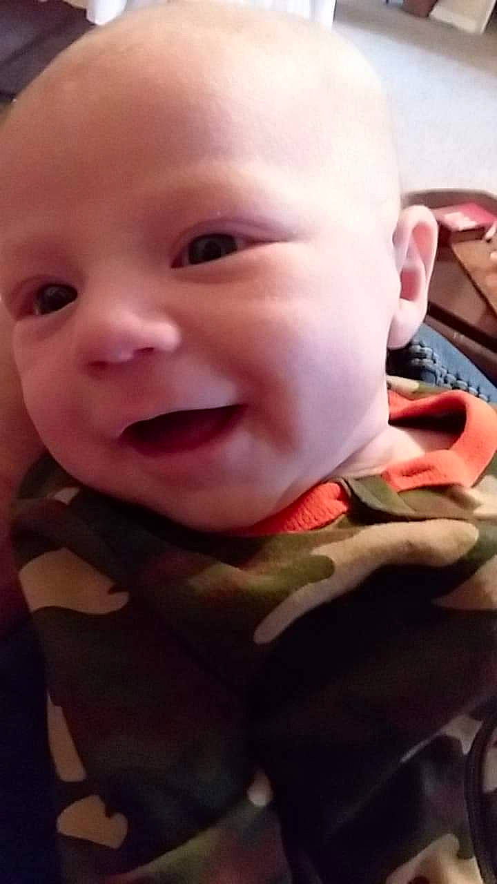 Aydan is registered to the contest to win money with this photo: boy, cheek, child, chin, ear, eye, eyebrow, face, finger, forehead, hand, head, infant, lip, mouth, nose, person, product, skin, smile