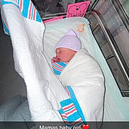 Paisley joined the competition — help win amazing prizes! newborn, baby, infant, sleeping, swaddled, hospital, bassinet, blanket, hat, striped_hat, pacifier, pink, white, portrait, face, closed_eyes, baby_girl, hospital_room, snapchat, text_overlay