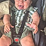 Jack joined the competition — help win amazing prizes! baby, child, smiling, tongue_out, stroller, car_seat, green_clothing, striped_shirt, happy, cute, infant, sitting, baby_boy, playful, hand, legs, seatbelt, toy, blanket, indoor