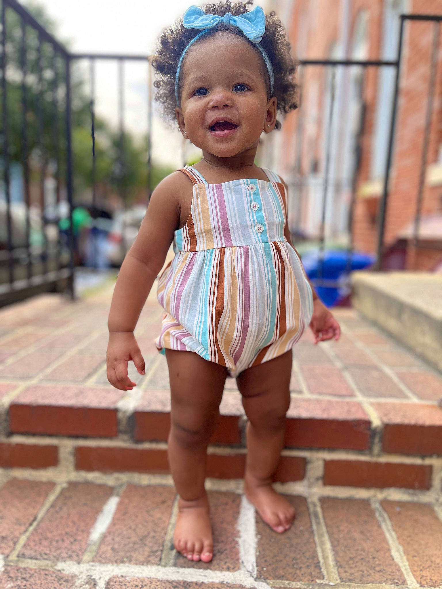 Melodi joined the competition — help win amazing prizes! baby, baby_toddler_clothing, child, dress, eye, face, flooring, fun, hair, happy, head, leisure, person, pink, skin, smile, standing, thigh, toddler, waist