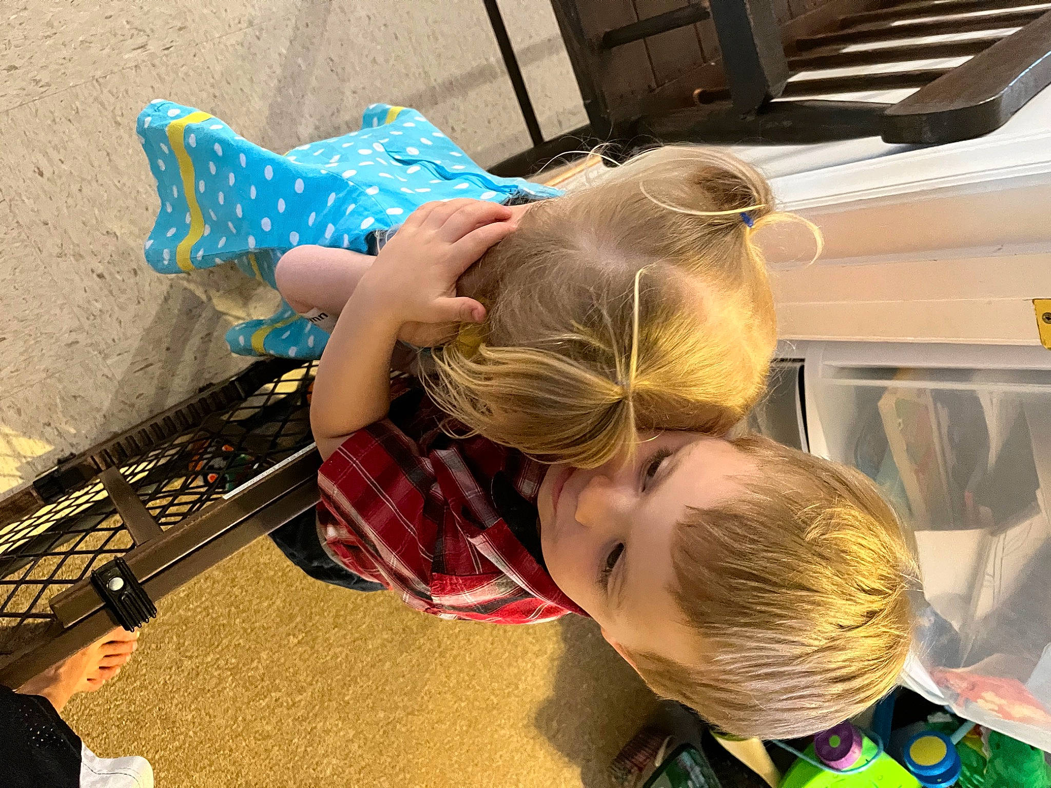 Riley is registered to the contest to win money with this photo: baby, child, eyewear, flooring, fun, grass, happy, joint, leisure, pattern, person, play, recreation, sitting, sunglasses, t_shirt, toddler, tree, vacation, visual_arts