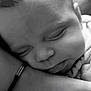 Kingsley is registered to the contest to win money with this photo: baby, sleeping, face, closeup, black_and_white, arm, skin, peaceful, resting, infant, newborn, portrait, person, soft, calm, cute, child, love, tender, cozy