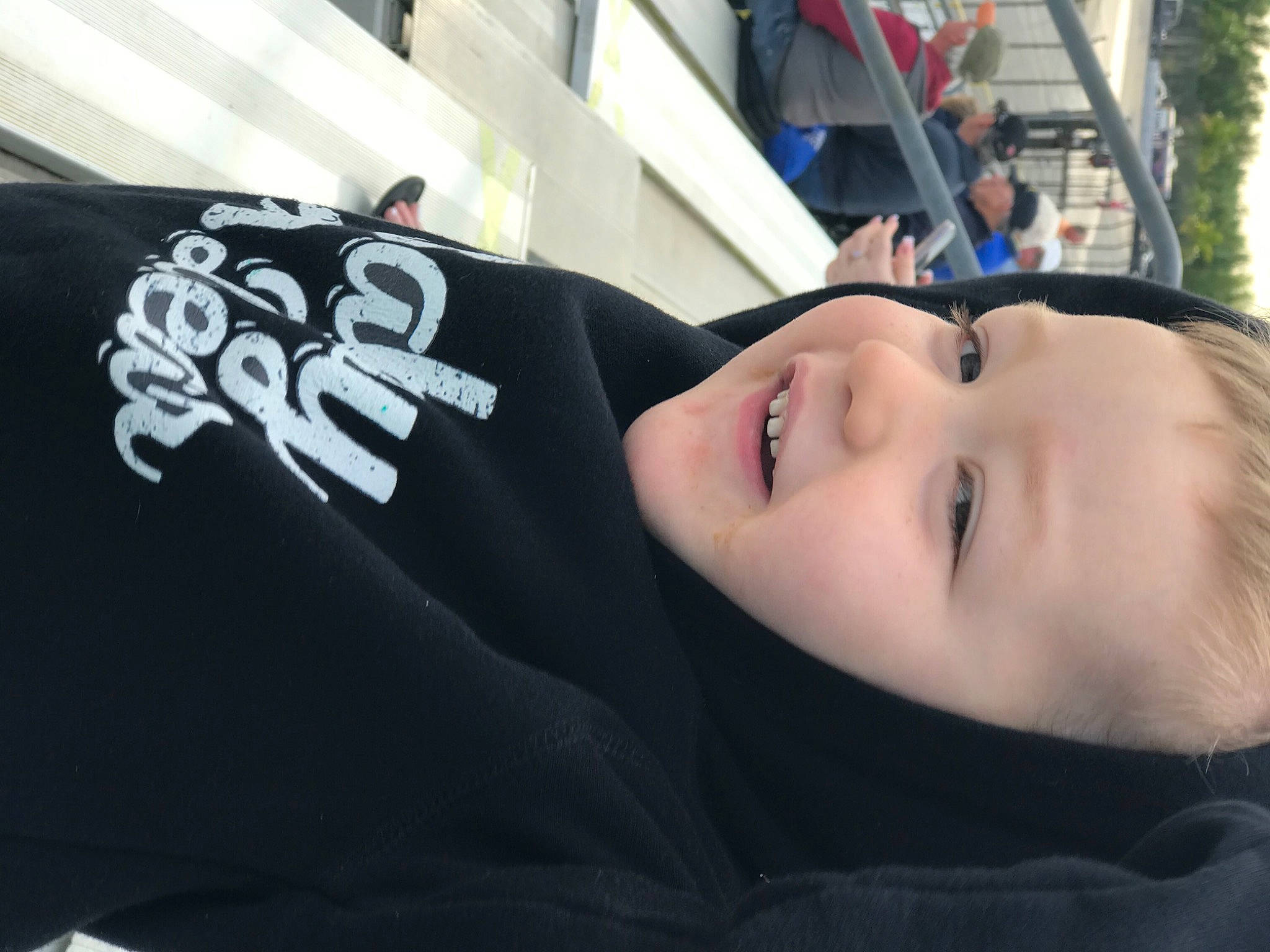 Greyson is registered to the contest to win money with this photo: child, eyelash, font, person, plant, sleeve, smile, toddler, tree