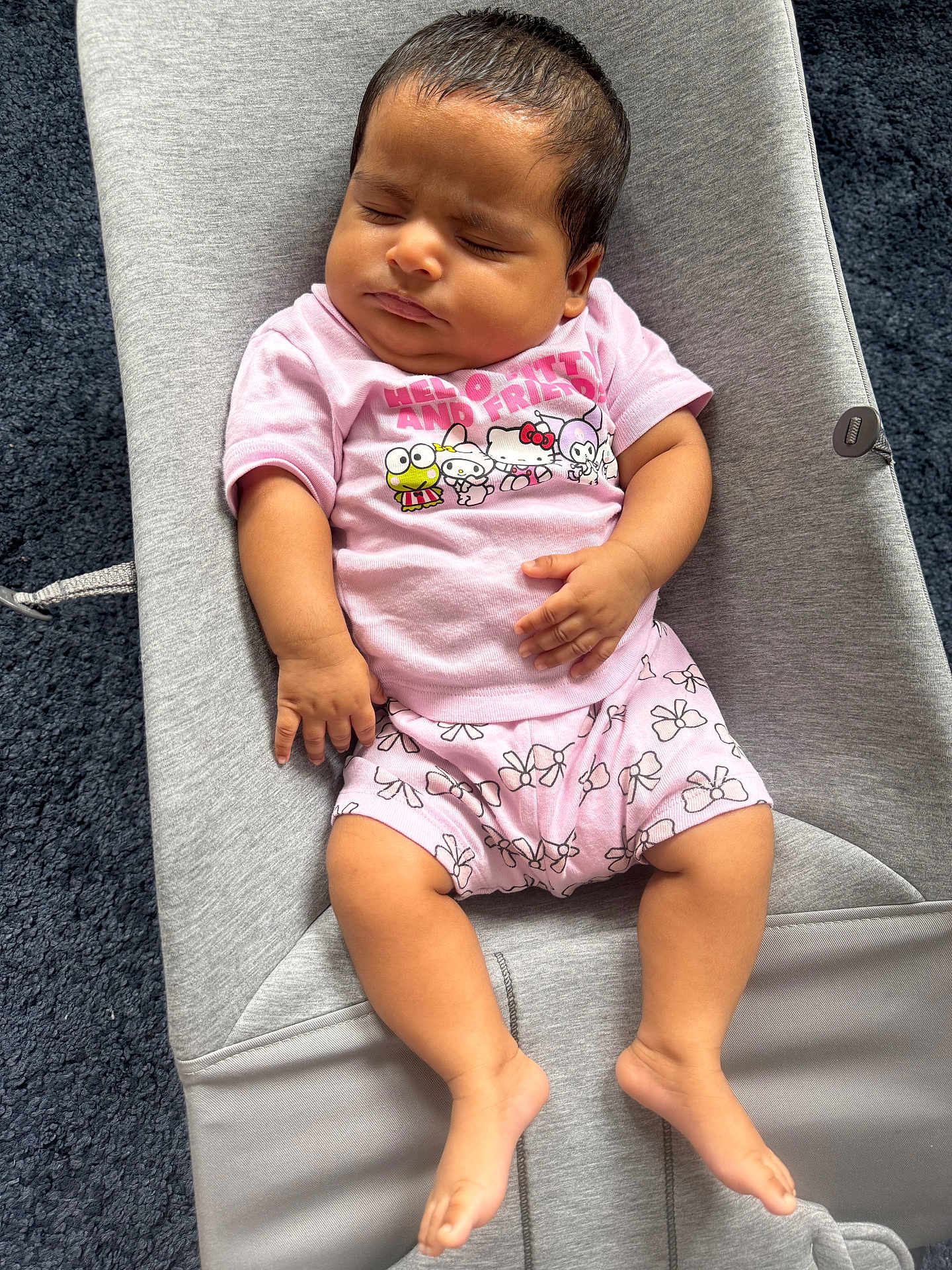 Minha is registered to the contest to win money with this photo: baby, infant, sleeping, pink_clothing, hello_kitty, baby_seat, gray, carpet, cute, chubby, hand, foot, toddler, indoors, resting, portrait, child, comfort, soft, peaceful