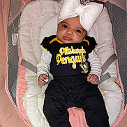 Lillyana joined the competition — help win amazing prizes! baby, baby_seat, black_clothing, blanket, bouncer, child, cushion, cute, eyes_open, face, hockey, indoors, infant, lying_down, pink, pittsburgh_penguins, portrait, sports_outfit, text_on_clothing, white_bow