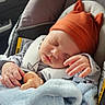 Zaiden joined the competition — help win amazing prizes! baby, sleeping, car_seat, blanket, orange_hat, infant, child, cozy, cute, indoors, car_interior, peaceful, soft_light, bundle, clothing, hand, face, nap, rest, transportation