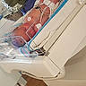 baby, bed, blanket, caregiver, diaper, healthcare, hospital, hospital_room, incubator, infant, medical_care, medical_equipment, monitoring, newborn, nurse, patient, person, resting, tubes, wood_floor