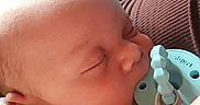 Zaiden is registered to the contest to win money with this photo: baby, sleeping, pacifier, infant, closeup, indoor, peaceful, child, face, skin, arm, soft, rest, cozy, newborn, comfort, blanket, cuddle, head, quiet