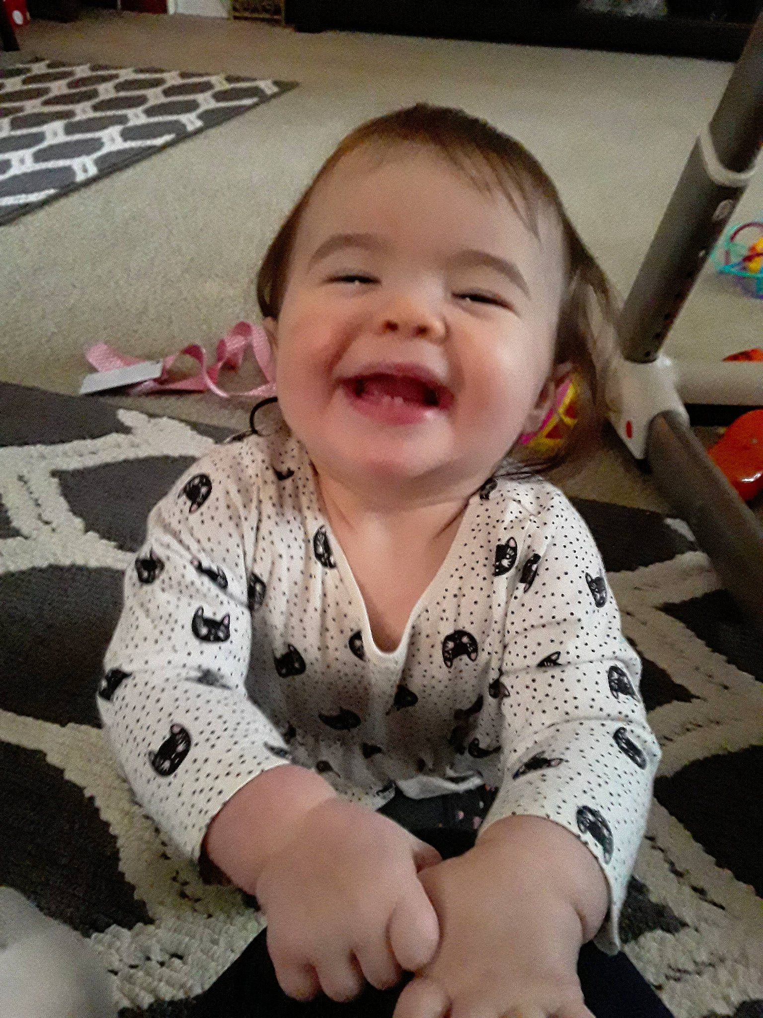 Laurel joined the competition — help win amazing prizes! baby, cheek, child, face, finger, head, nose, person, play, sitting, skin, smile, thumb, toddler