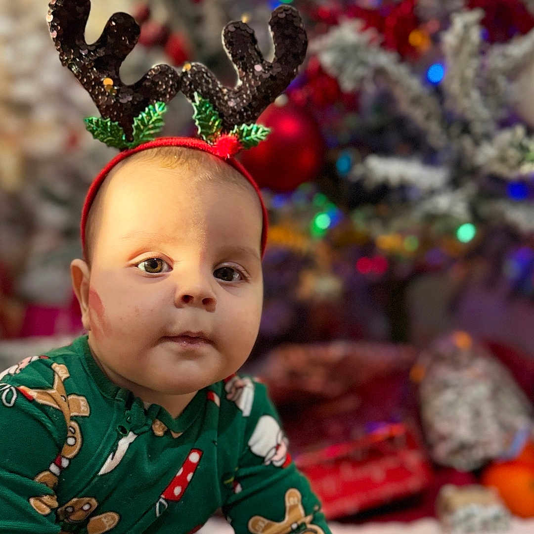 Matteo joined the competition — help win amazing prizes! baby, candy_cane, child, christmas_pajamas, christmas_tree, cute, decorations, festive, floor, gift_wrap, gingerbread_man, holiday, holiday_season, indoor, pajamas, portrait, present, reindeer_antlers, seasonal, wooden_floor