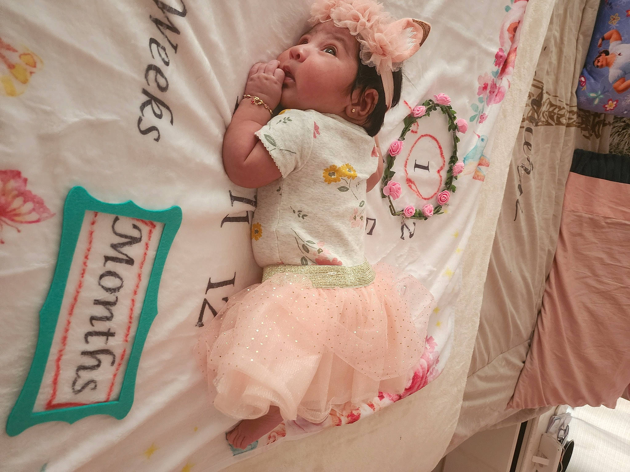 Arianna Aguilar joined the competition — help win amazing prizes! baby, baby_products, baby_toddler_clothing, bedding, child, comfort, event, fashion_design, flesh, font, fur, headwear, linens, magenta, pattern, peach, person, pink, room, sleeve