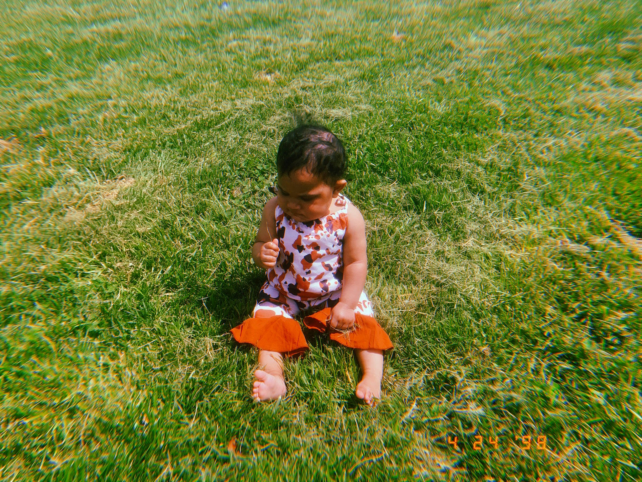 Mayari is registered to the contest to win money with this photo: baby, baby_toddler_clothing, dress, fun, grass, grass_family, grassland, groundcover, happy, head, human_body, leaf, mammal, meadow, natural_environment, people_in_nature, person, plant, sunlight, toddler