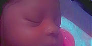 Ayannah joined the competition — help win amazing prizes! baby, sleeping, infant, close_up, pink_clothing, owl_design, indoor, cozy, peaceful, child, face, portrait, cute, soft_lighting, resting, newborn, apparel, polka_dots, peace, calm
