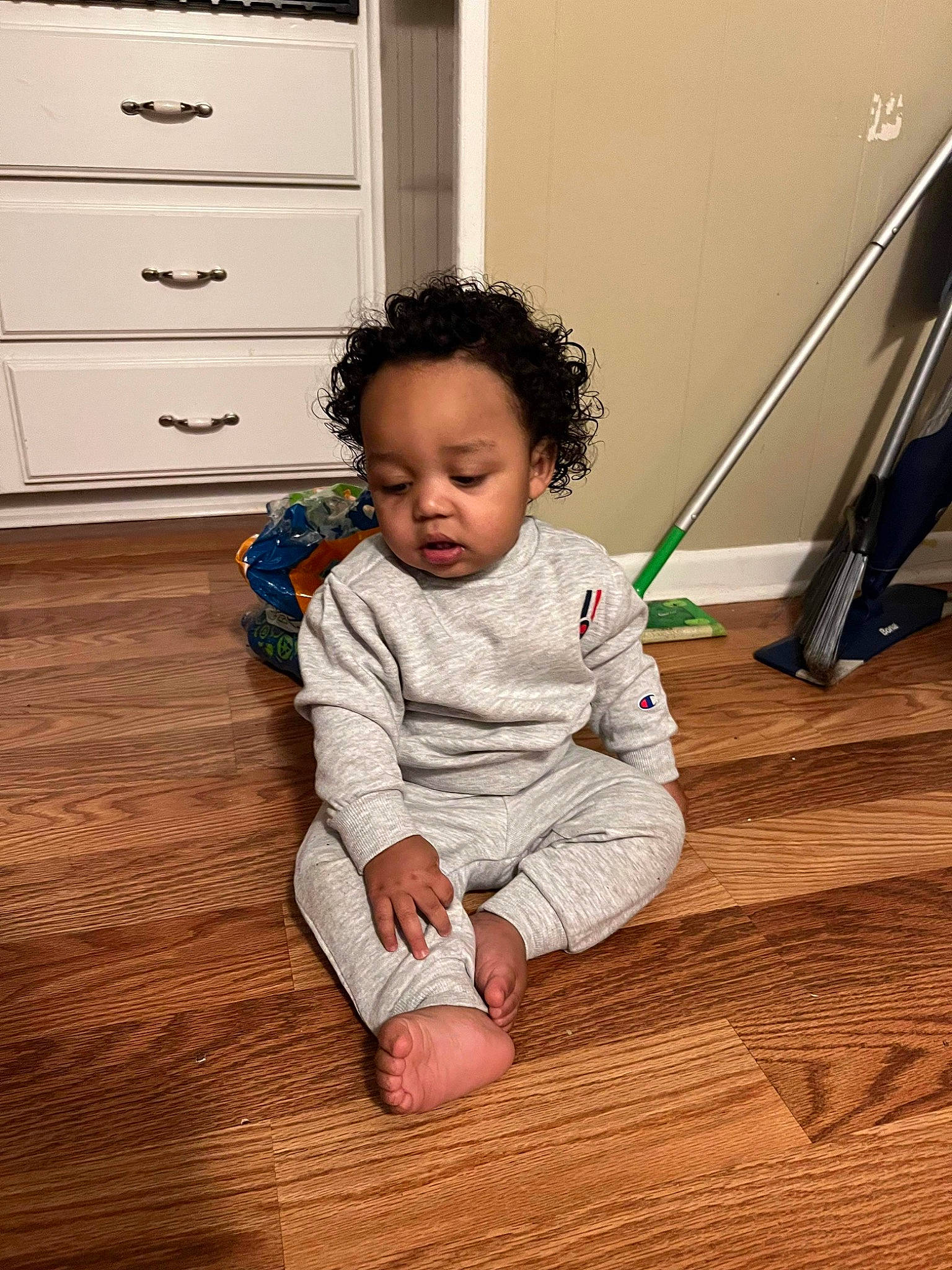 Kingston joined the competition — help win amazing prizes! baby, baby_toddler_clothing, cabinetry, chest, chest_of_drawers, comfort, drawer, dresser, eye, floor, flooring, hair, hardwood, laminate_flooring, person, sleeve, standing, toddler, wood, wood_flooring