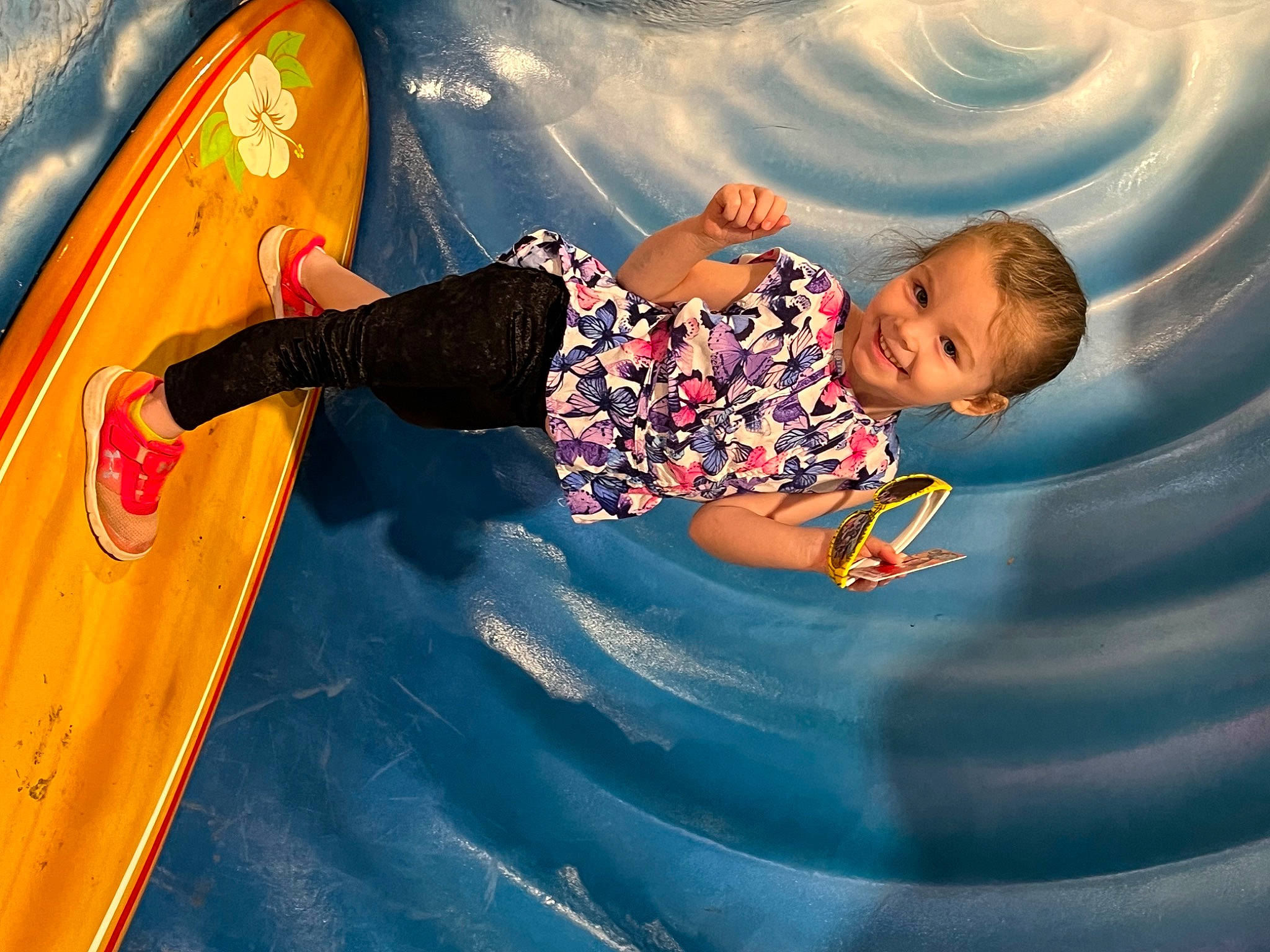 Adelyn is registered to the contest to win money with this photo: baby, baby_toddler_clothing, child, chute, circle, electric_blue, flash_photography, fun, happy, inflatable, joy, leisure, outdoor_play_equipment, pattern, people_in_nature, person, play, playground, recreation, toddler
