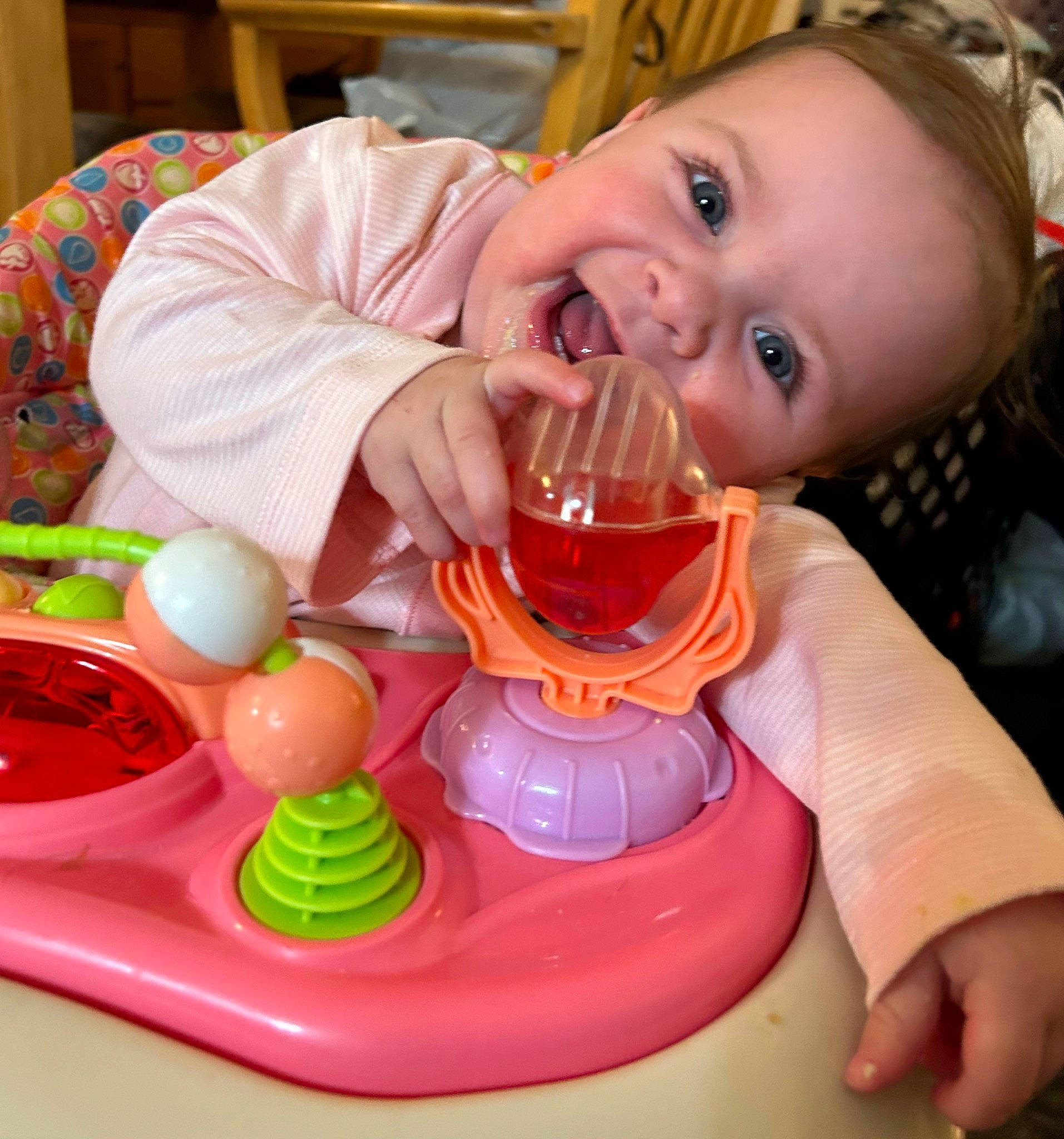 Harlow is registered to the contest to win money with this photo: baby, baby_playing_with_toys, baby_products, baby_toddler_clothing, baby_toys, cheek, child, drinkware, event, fun, happy, orange, person, play, recreation, sitting, smile, sweetness, tableware, toddler