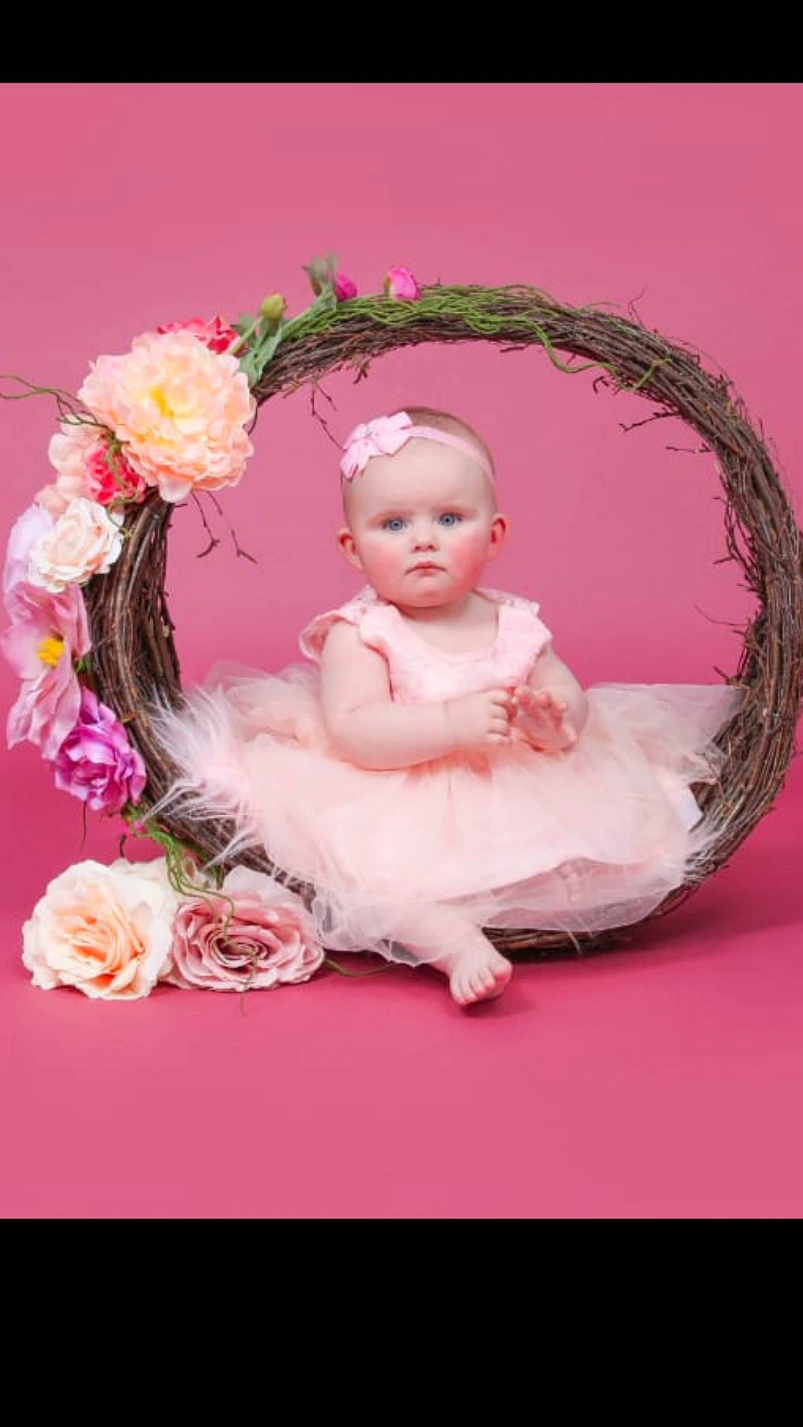 Mia-grace joined the competition — help win amazing prizes! baby, child, child_model, flower, hair_accessory, headpiece, person, petal, photograph, photography, pink, plant, product, smile, toddler