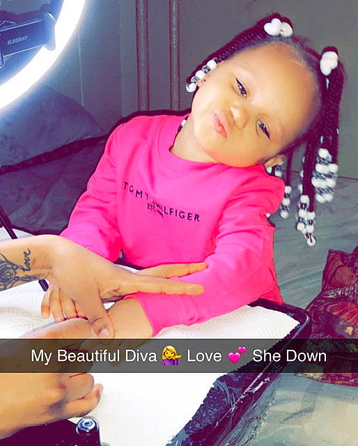 Zaila is registered to the contest to win money with this photo: baby, baby_toddler_clothing, car_seat, eyebrow, finger, font, fun, gesture, happy, magenta, mouth, nail, person, photo_caption, pink, product, sitting, sleeve, snapshot, thumb