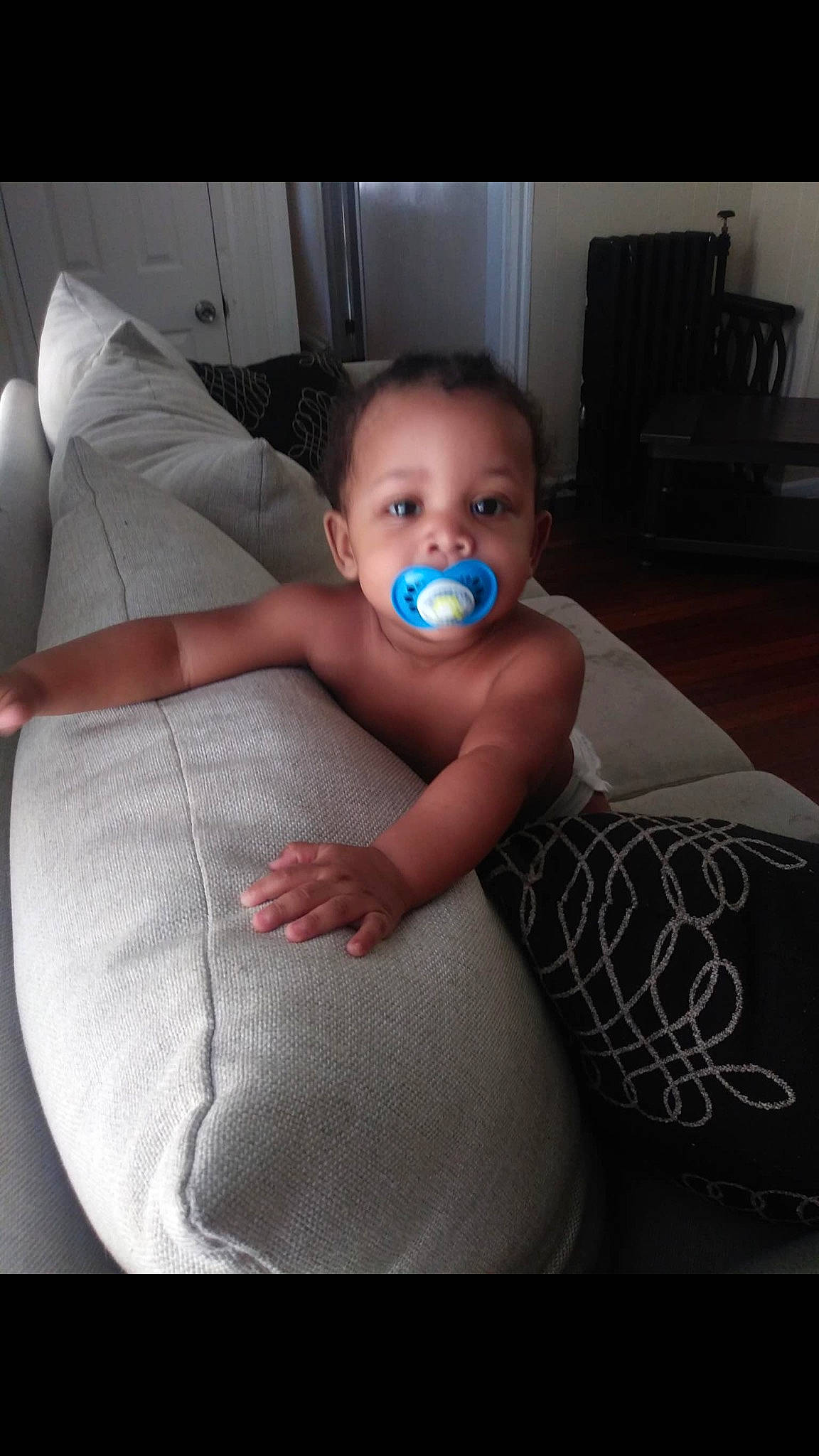 Kymani is registered to the contest to win money with this photo: abdomen, arm, baby, ball, child, eye, face, facial_expression, fun, head, joy, leg, mouth, nose, person, skin, smile, toddler, trunk