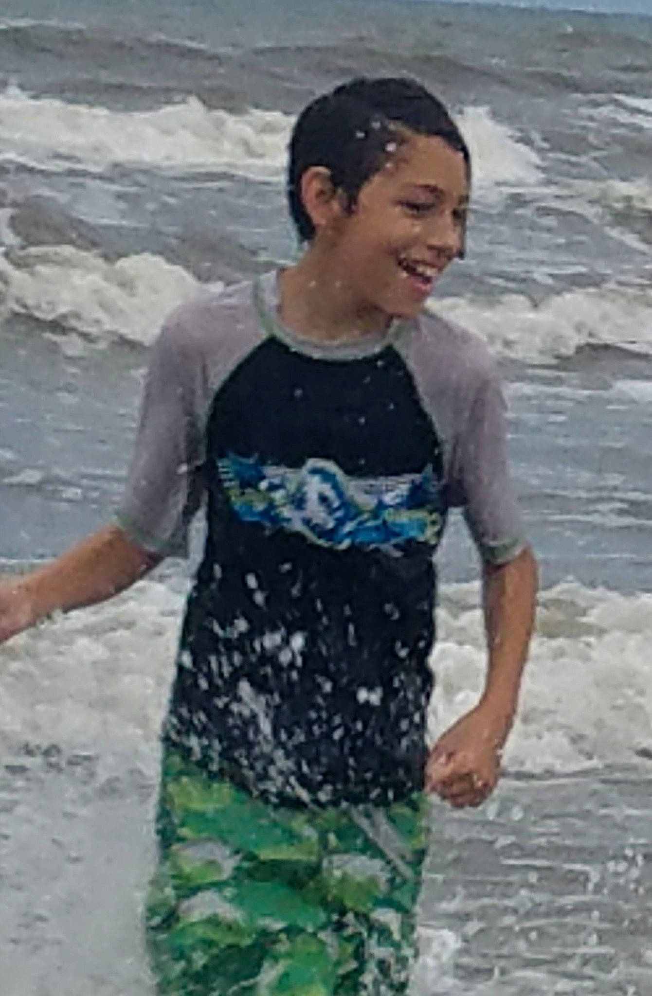 Aiden is registered to the contest to win money with this photo: fun, joy, neck, person, summer, t_shirt, vacation