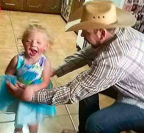 Aria joined the competition — help win amazing prizes! baby, blond, child, cowboy_hat, daughter, father, fun, grandparent, hat, headgear, laugh, leg, people, person, play, sitting, toddler