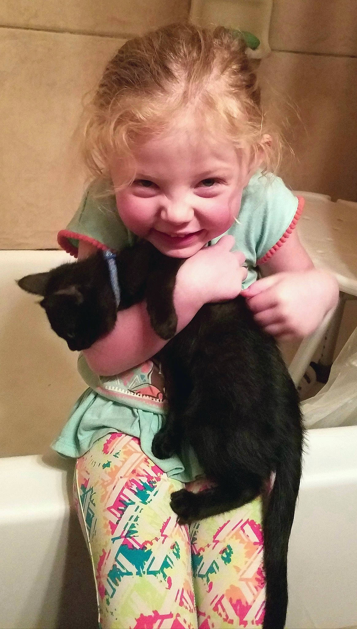 Aria is registered to the contest to win money with this photo: cat, cheek, child, ear, felidae, long_hair, person, shoulder, skin, small_to_medium_sized_cats, toddler, tooth