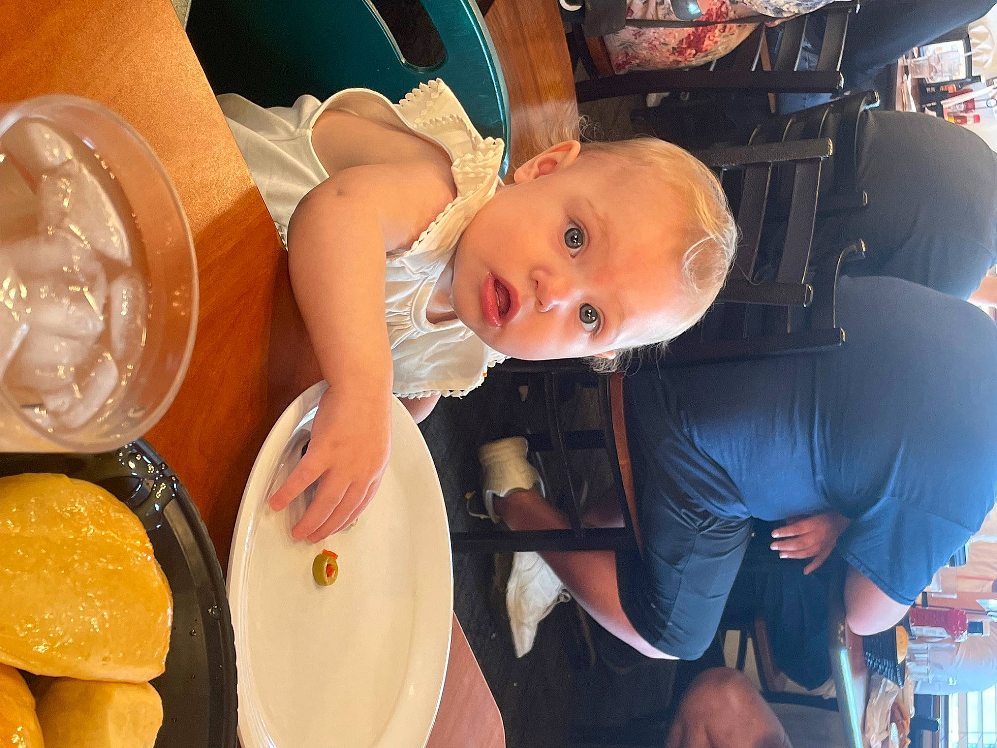 Scarlette is registered to the contest to win money with this photo: auto_part, baby, car_seat, chair, child, comfort_food, cooking, cuisine, dish, dishware, event, food, fun, hat, helmet, ingredient, junk_food, person, plate, surprise