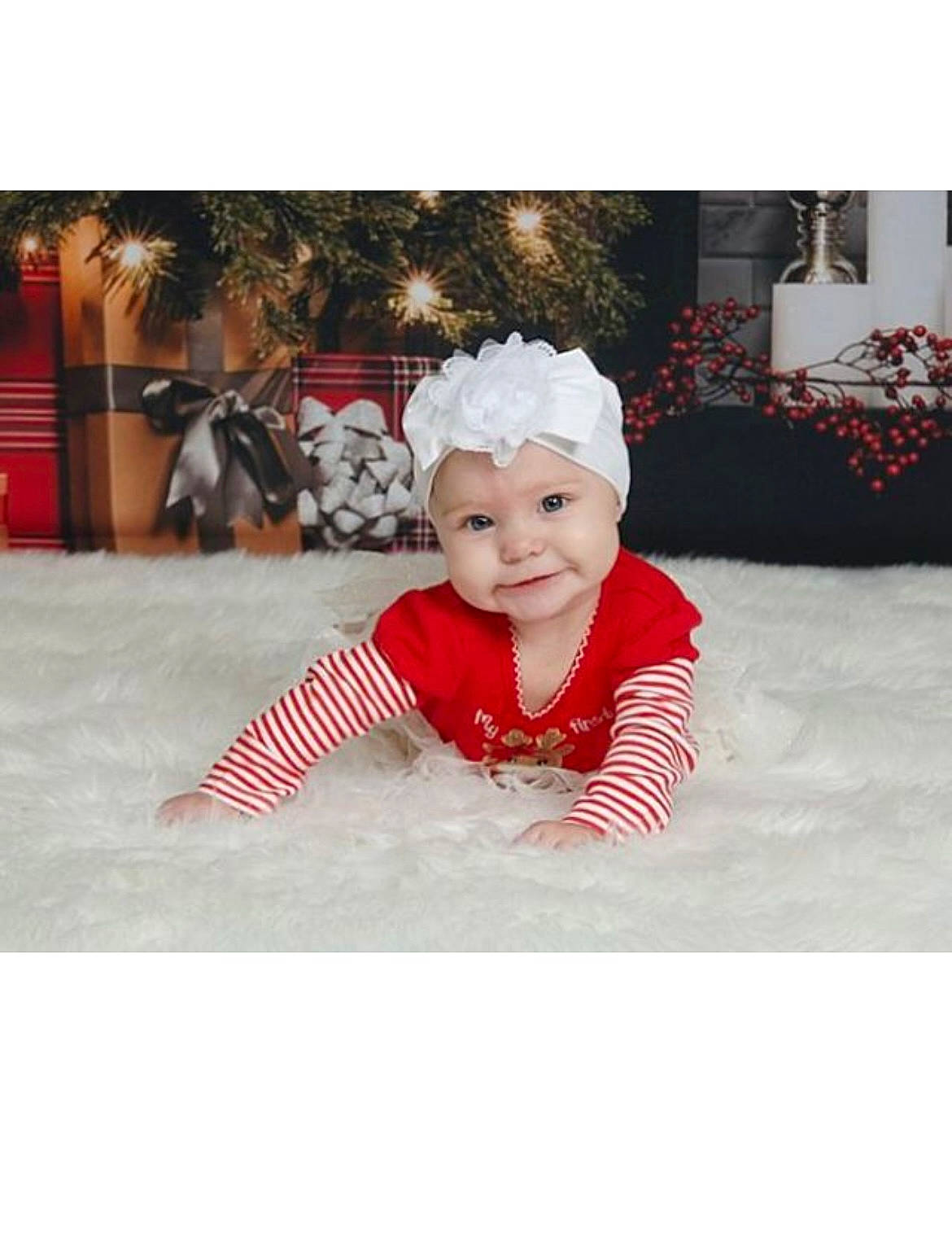 Scarlette is registered to the contest to win money with this photo: baby, baby_laughing, baby_toddler_clothing, child, christmas_eve, costume_hat, event, freezing, fun, happy, headwear, holiday, magenta, pattern, person, rectangle, room, sleeve, smile, snow