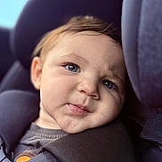 Jaxson joined the competition — help win amazing prizes! toddler, child, portrait, car_seat, baby, seat_belt, blue_eyes, face, expression, cushion, clothing, infant, straps, car_interior, cute, close_up, young_child, sitting, head, skin