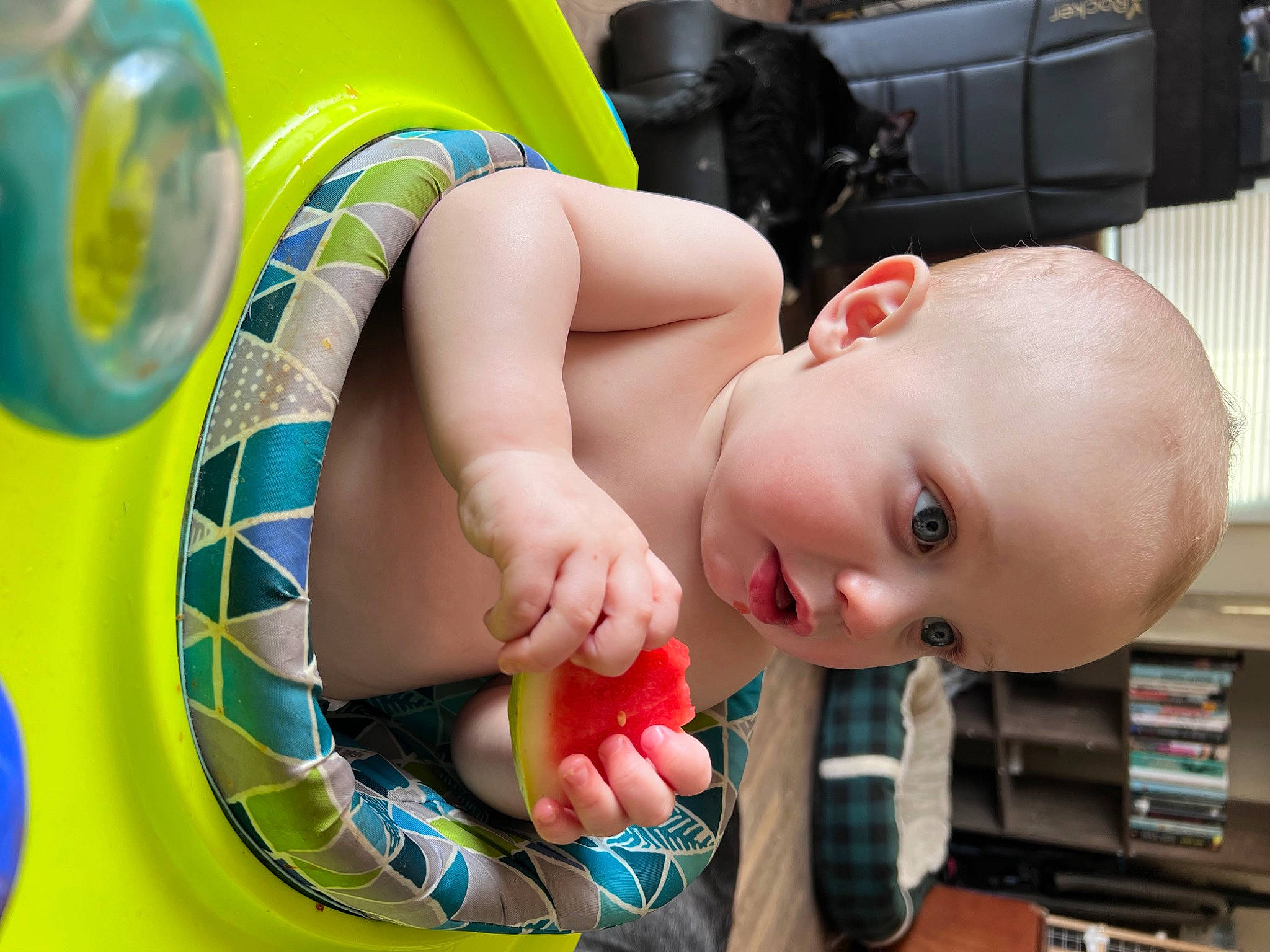Oliver is registered to the contest to win money with this photo: automotive_tire, automotive_wheel_system, baby, baby_products, bathing, bookcase, chest, child, fun, happy, inflatable, leisure, person, play, recreation, room, shelf, sitting, skin, toddler