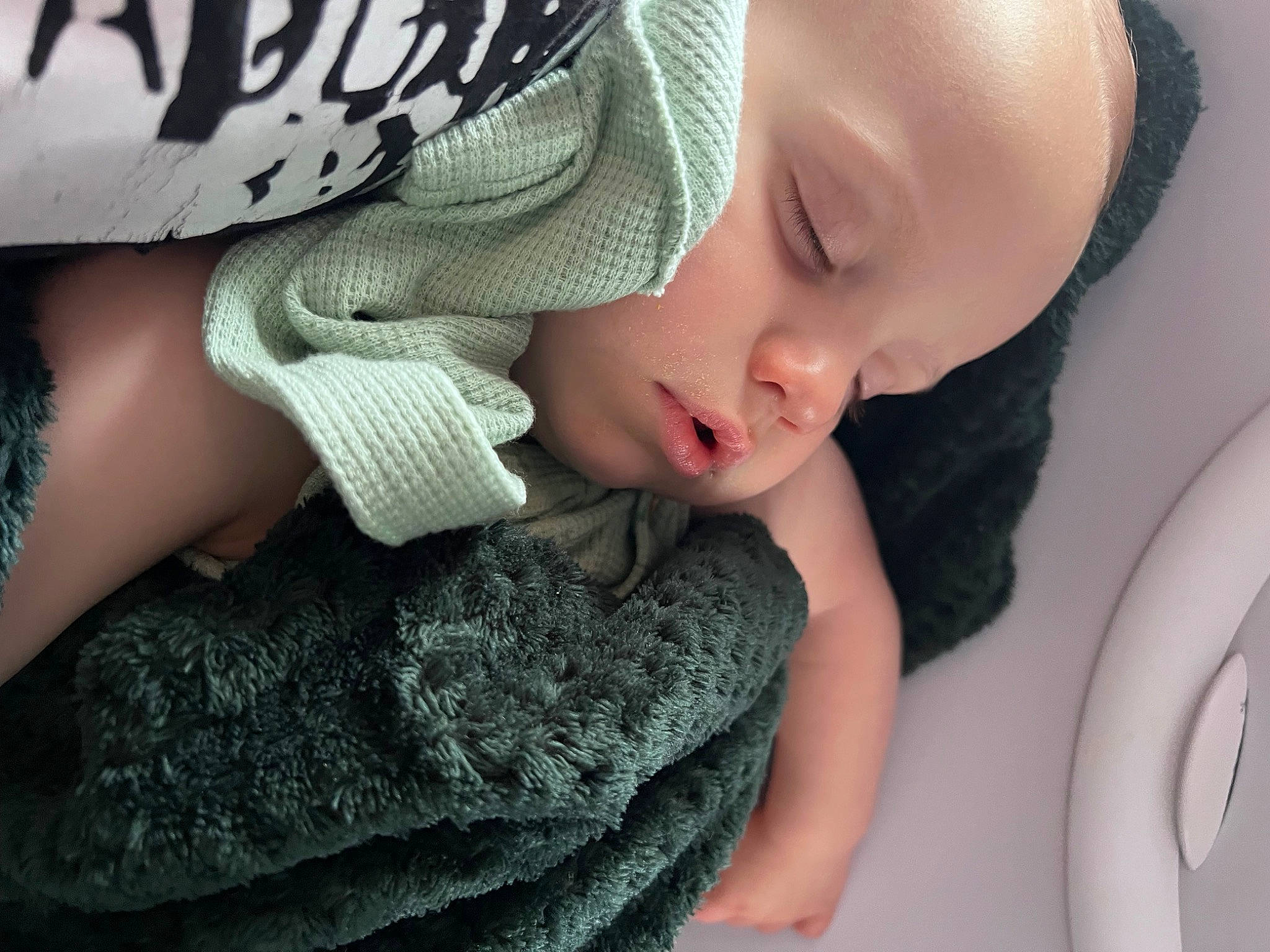 Oliver joined the competition — help win amazing prizes! baby, baby_sleeping, baby_toddler_clothing, cap, comfort, elbow, eyelash, finger, gesture, grey, hand, happy, human_body, joint, linens, nail, neck, person, skin, sleeve