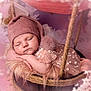 baby, sleeping, pink, hat, basket, swing, cozy, fur, dress, flower_pattern, cute, child, infant, soft, resting, portrait, indoors, peaceful, adorable, newborn