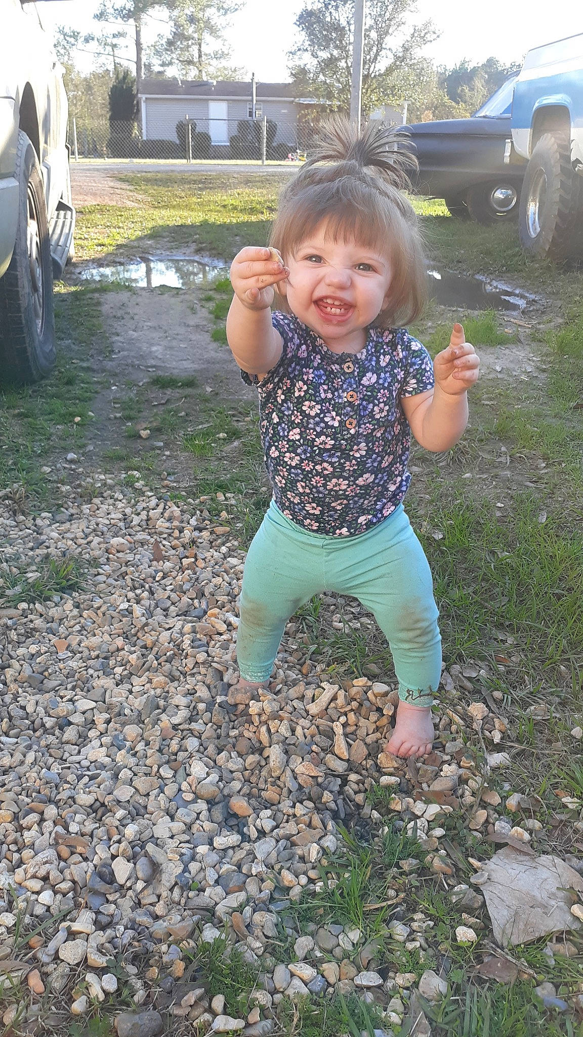 Skye is registered to the contest to win money with this photo: car, child, fun, grass, joy, leaf, person, plant, play, smile, soil, toddler, vehicle