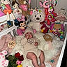 Sahily joined the competition — help win amazing prizes! baby, crib, stuffed_animals, toy, cake, flowers, blanket, knit_hat, knit_outfit, celebration, infant, plush_toy, teddy_bear, doll, mickey_mouse, pink, white, cute, child, indoor