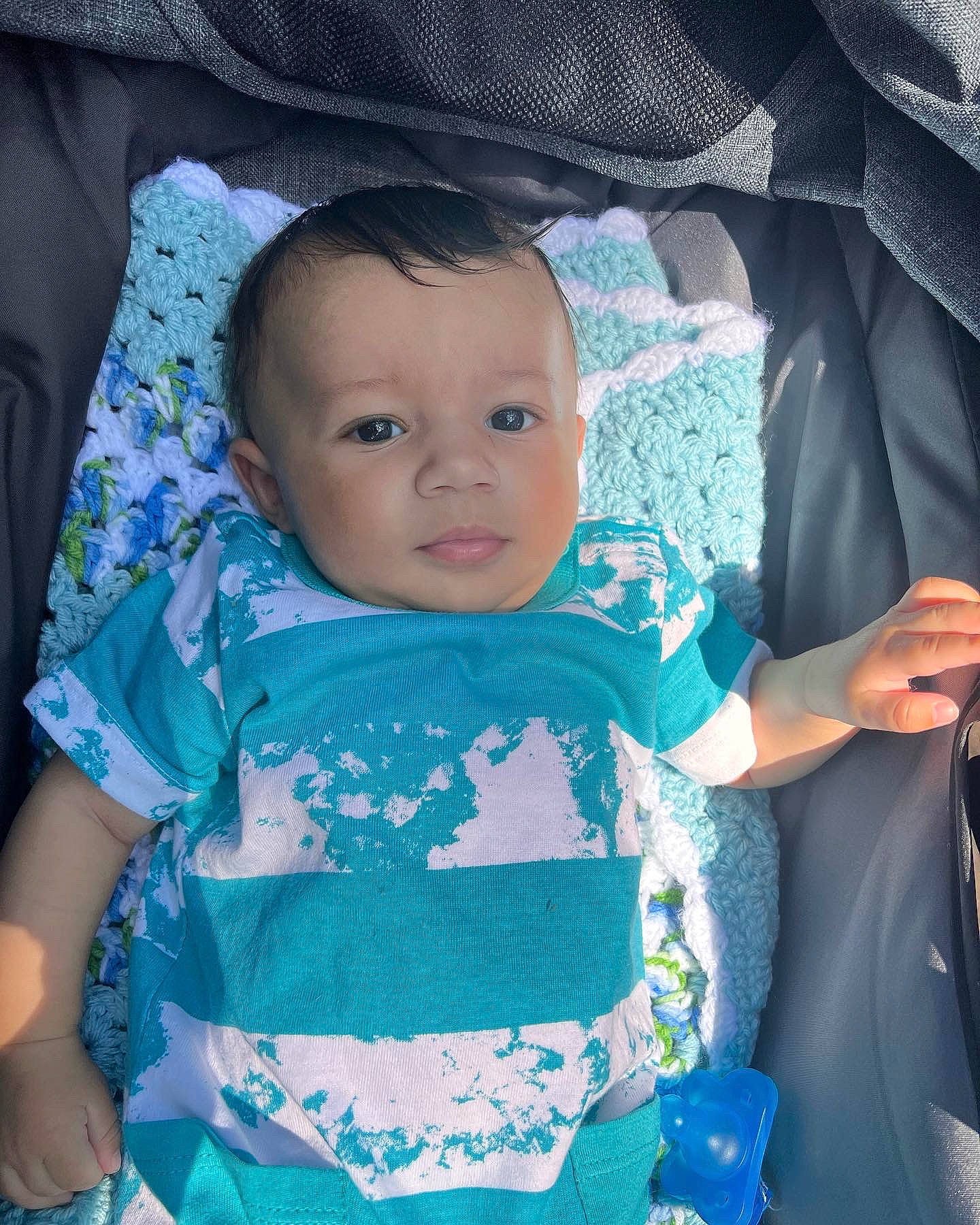 Zeppelin is registered to the contest to win money with this photo: azure, baby, baby_carriage, baby_products, baby_toddler_clothing, blue, car_seat, cheek, child, comfort, cool, electric_blue, facial_expression, hairstyle, iris, person, skin, sleeve, textile, tints_and_shades