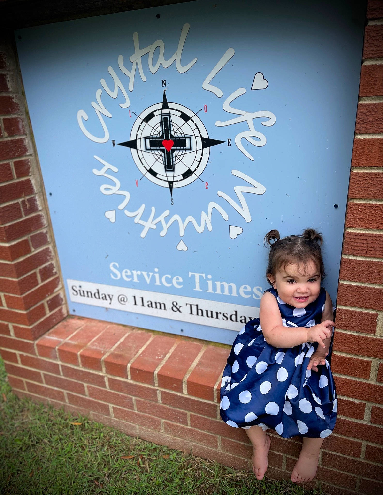 Willow is registered to the contest to win money with this photo: advertising, automotive_wheel_system, baby_toddler_clothing, brick, brickwork, design, electric_blue, flag, flag_of_the_united_states, font, graphics, grass, happy, joy, logo, pattern, person, plant, sign, signage