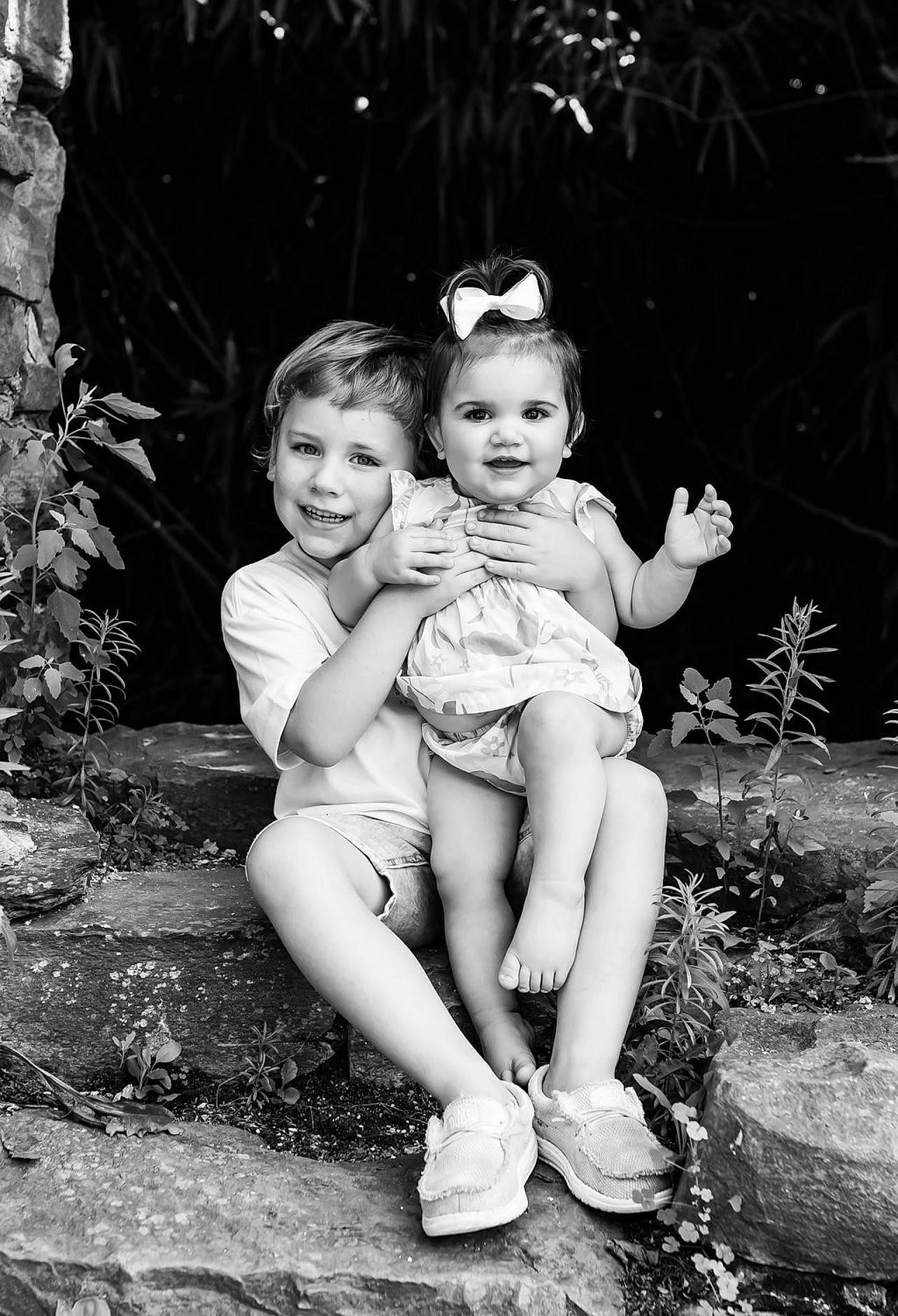 Willow joined the competition — help win amazing prizes! baby, black, black_and_white, child, facial_expression, flash_photography, fun, grass, hairstyle, happy, joy, leg, monochrome, monochrome_photography, people_in_nature, person, plant, smile, standing, style