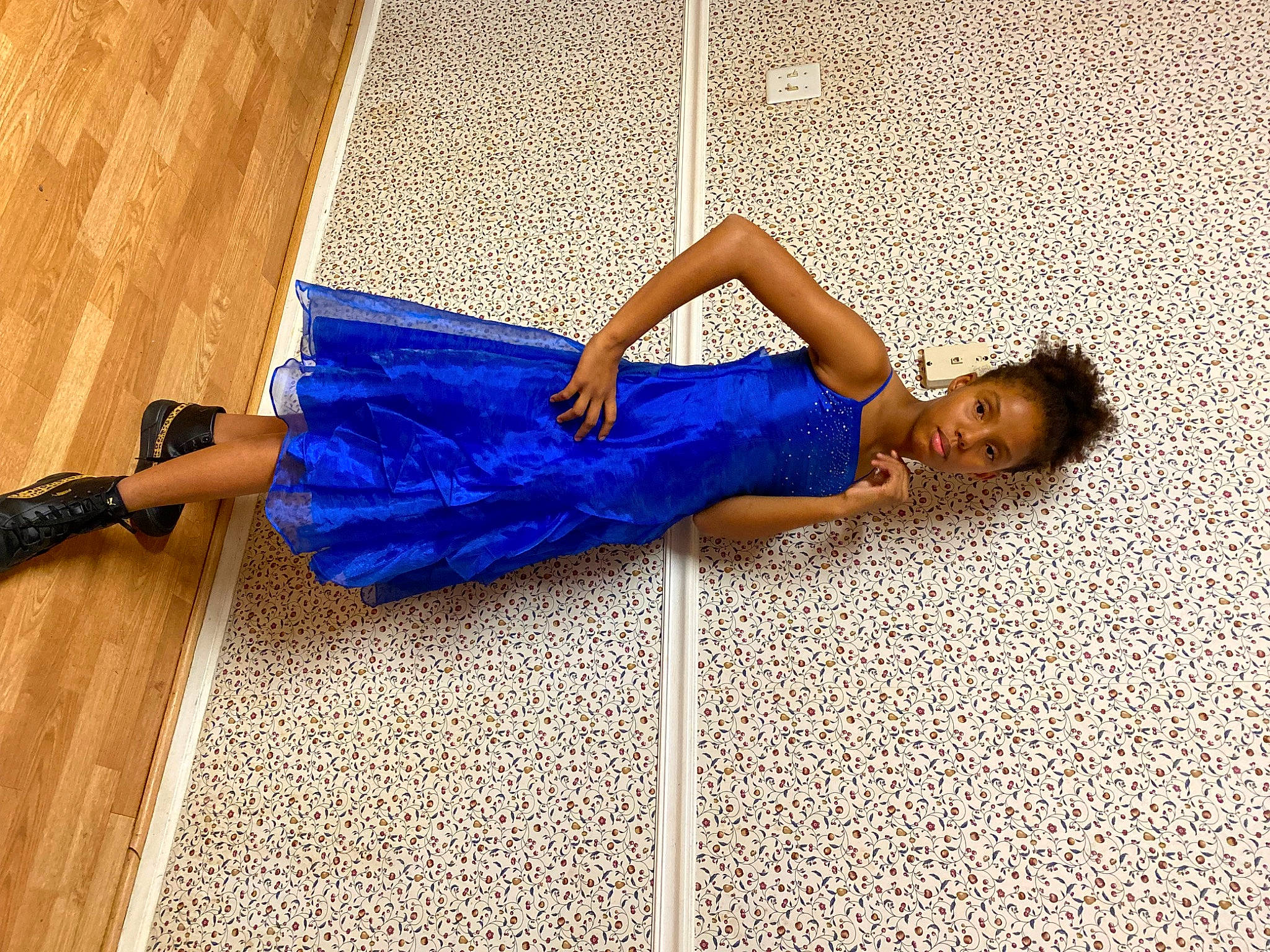 Malia is registered to the contest to win money with this photo: calf, comfort, denim, dress, elbow, electric_blue, floor, flooring, foot, human_body, human_leg, joint, knee, leg, leisure, person, sidewalk, thigh, trunk, waist