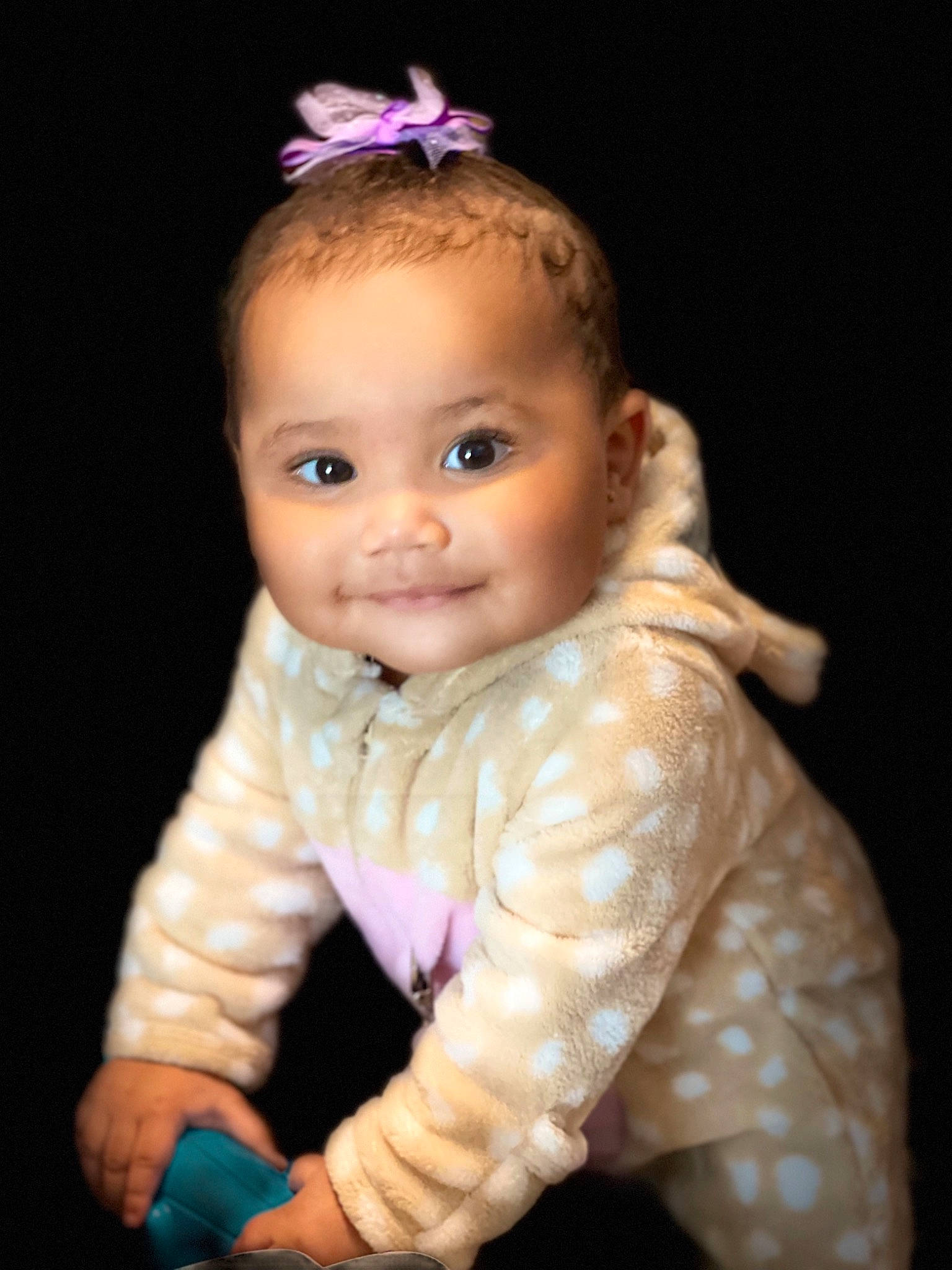 Khaleia is registered to the contest to win money with this photo: baby, baby_toddler_clothing, cheek, child, eye, fashion_accessory, flash_photography, gesture, hair, headband, headpiece, human_body, iris, joy, lip, nose, person, purple, skin, sleeve