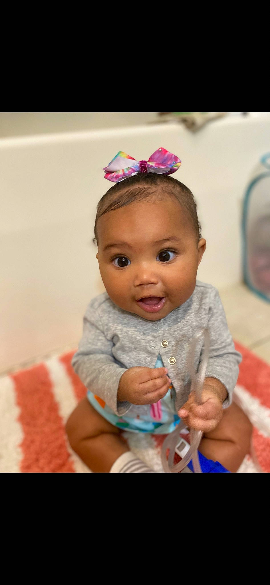 Khaleia joined the competition — help win amazing prizes! baby, baby_toddler_clothing, cheek, child, event, fashion_accessory, finger, fun, happy, headband, headpiece, iris, jewellery, magenta, nose, person, pink, sitting, skin, surprise