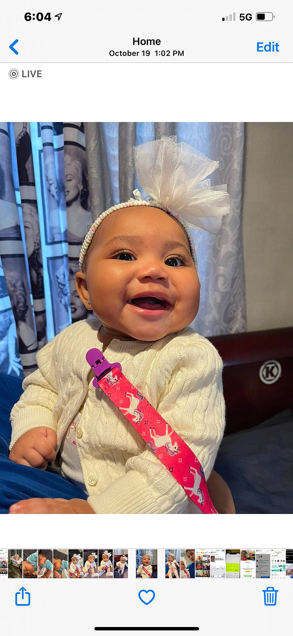 Khaleia Jo is registered to the contest to win money with this photo: art, baby, baby_laughing, baby_products, baby_toddler_clothing, cheek, child, comfort, electronic_device, fashion_accessory, fun, happy, headwear, magenta, nose, person, photograph, rectangle, smile, snapshot