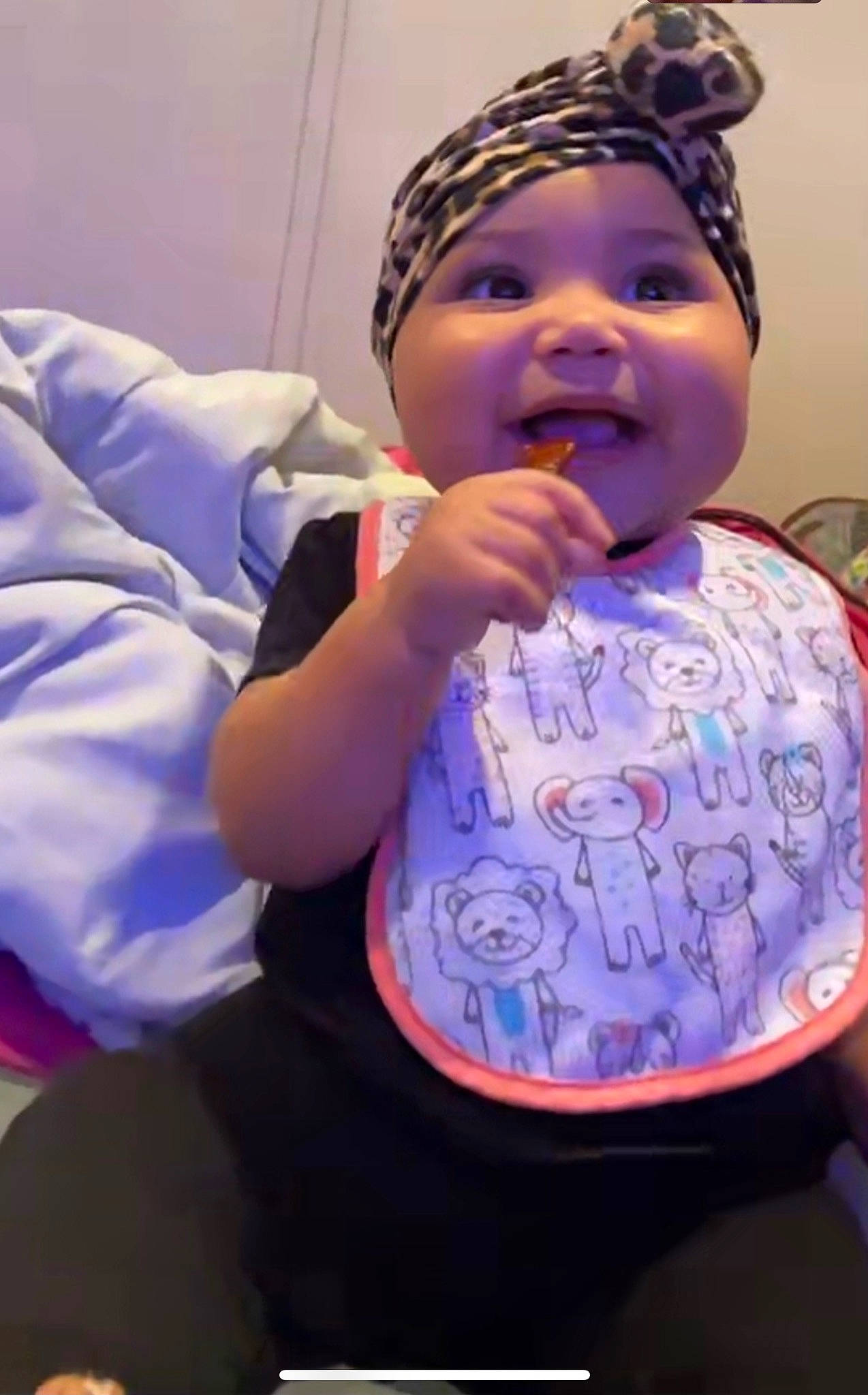 Khaleia Jo is registered to the contest to win money with this photo: arm, baby, baby_toddler_clothing, cheek, chin, eye, eyebrow, face, hand, happy, head, headwear, human_body, iris, lip, mouth, nose, person, purple, skin