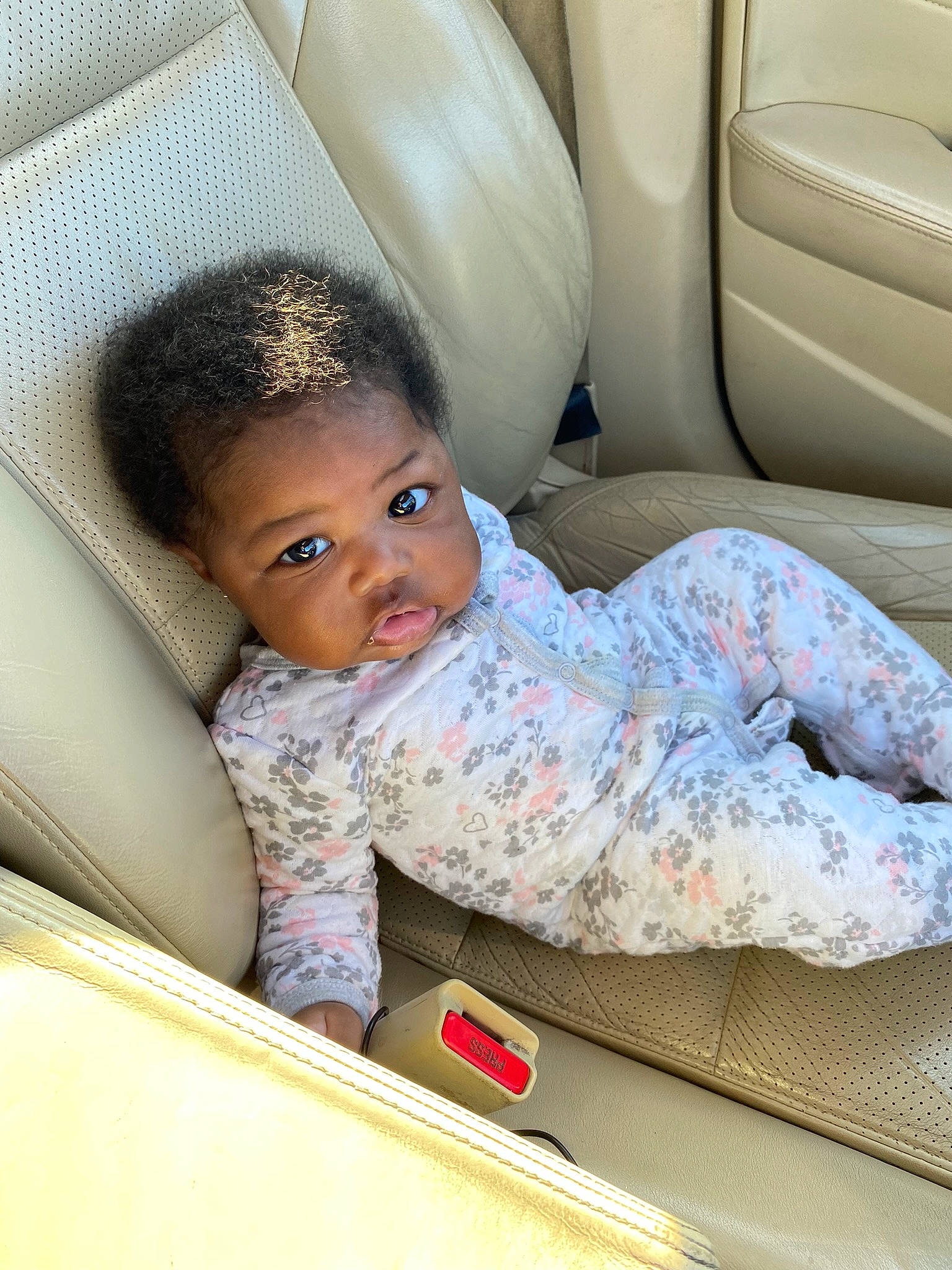 Aniyah is registered to the contest to win money with this photo: auto_part, automotive_design, baby, baby_products, baby_toddler_clothing, car, car_seat, car_seat_cover, child, comfort, eye, flooring, head, head_restraint, linens, luxury_vehicle, person, sitting, sleeve, toddler