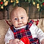 baby, infant, child, plaid, clothing, red, blue, white, face, portrait, holiday, christmas, decoration, bed, blanket, candy_cane, smile, cute, indoors, festive