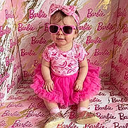 Aubree joined the competition — help win amazing prizes! baby, child, pink, sunglasses, bow, dress, tutu, shoes, socks, smiling, portrait, indoor, fashion, cute, toy_brand, barbie, background, patterned, seated, headband