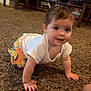 baby, carpet, carpet_texture, child, colorful_pants, crawling, curious, floor, furniture, happy, home, indoors, living_room, person, smiling, sunflower_pattern, television, white_shirt, wooden_chair, young_child