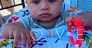 Zyon Lee is registered to the contest to win money with this photo: baby, infant, child, colorful, toy, seat, porch, window, door, clothing, expression, hands, face, indoor, play, cute, young, person, sitting, love_text