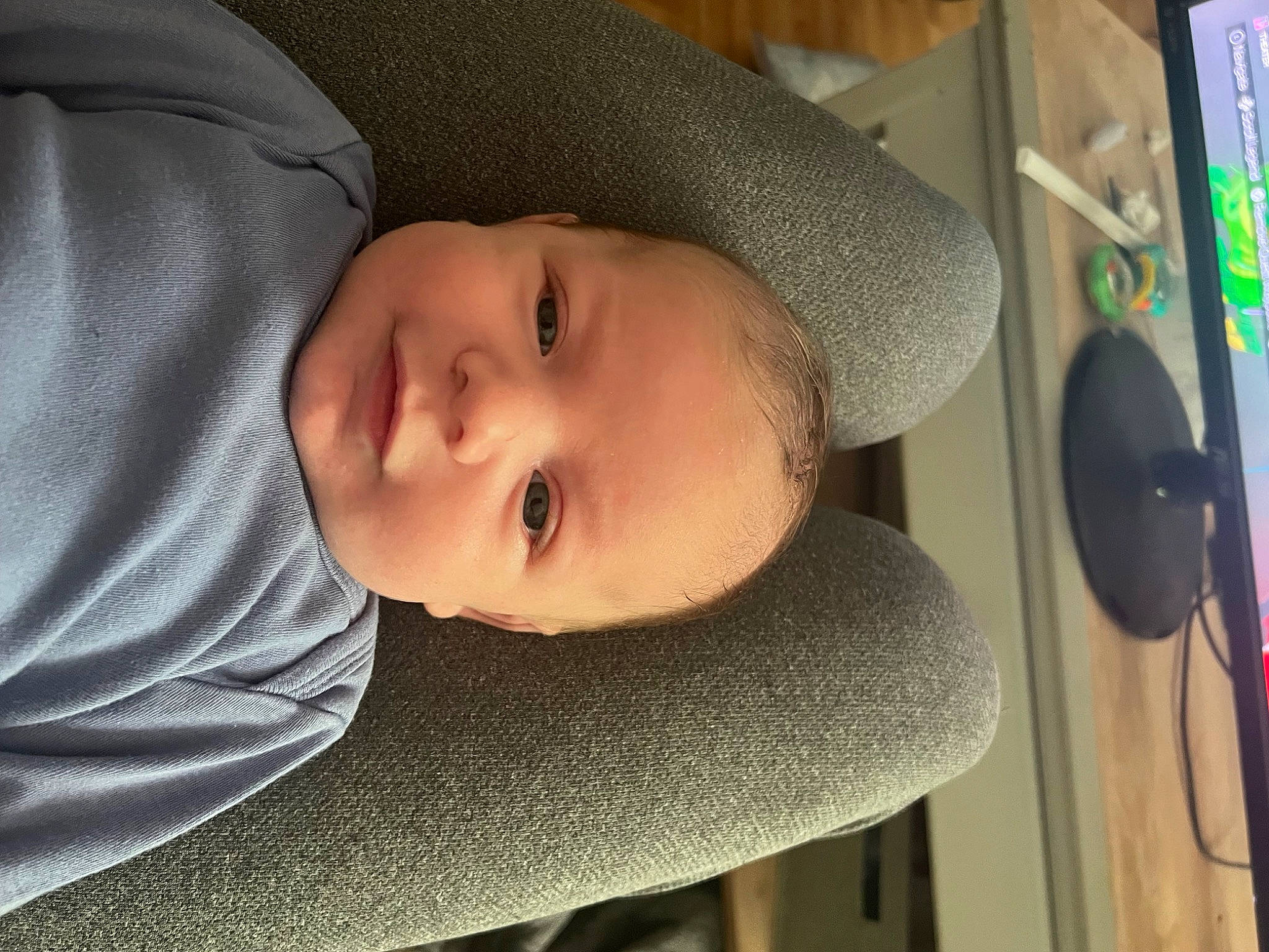 Kasen is registered to the contest to win money with this photo: audio_equipment, baby, baby_products, baby_toddler_clothing, cheek, child, chin, comfort, face, headgear, iris, lip, mammal, nose, person, room, skin, sleeve, smile, toddler